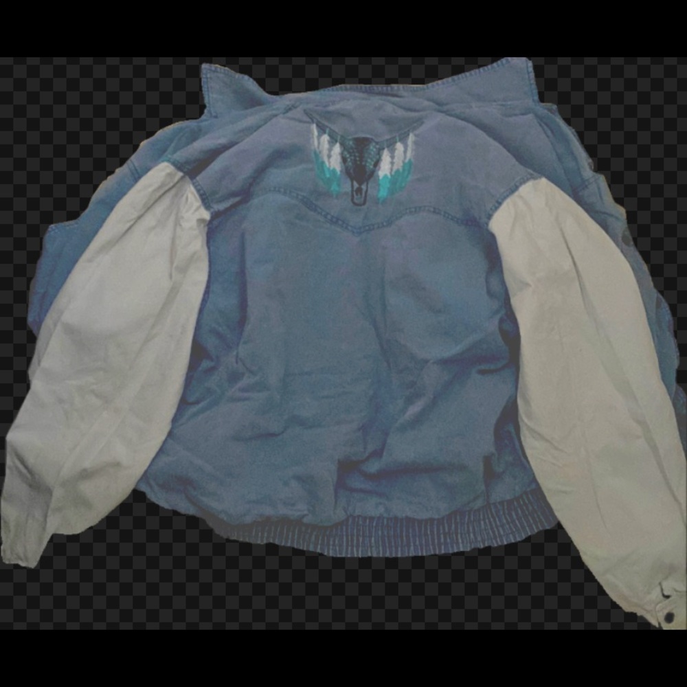 Vintage jean jacket with sewn on prints,inside and outside pockets,Diluted blue